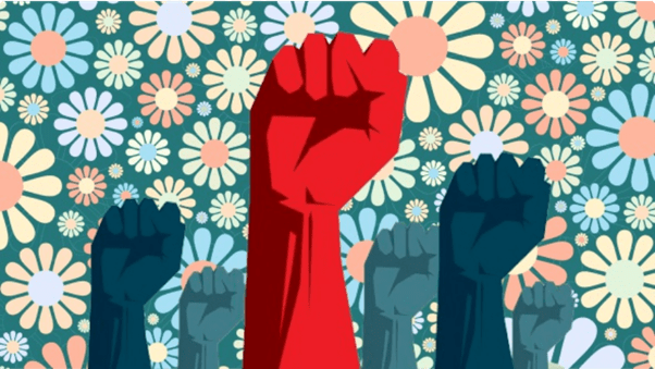 Raised fists of different shades against a floral background, symbolizing unity and strength amidst diversity.