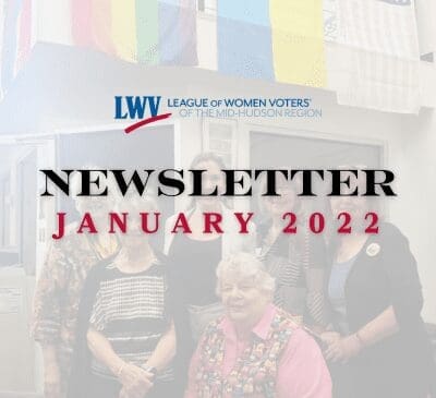 A group of women posing in front of colorful flags, with "LEAGUE OF WOMEN VOTERS OF THE MID-HUDSON REGION NEWSLETTER JANUARY 2022" text overlaid on the image.