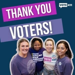 Four people smiling and standing together, wearing "Vote 411" and related shirts. Text above reads "Thank You Voters!" in bold white and pink letters on a dark background.